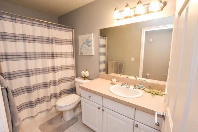 bathroom featuring tile patterned floors, walk in shower, vanity, and toilet