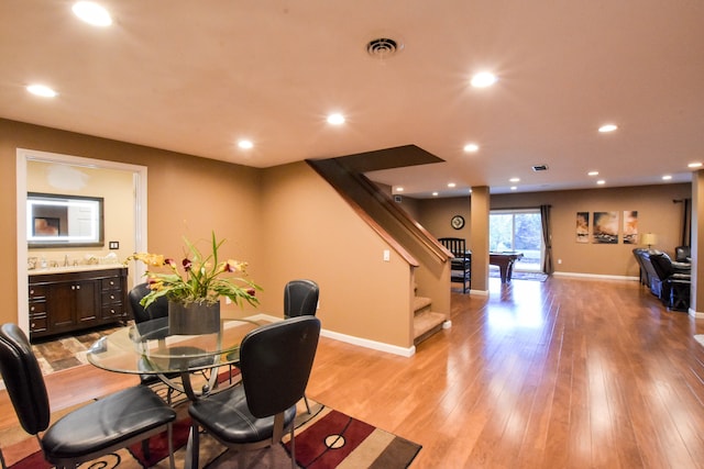 dining space featuring light hardwood / wood-style floors