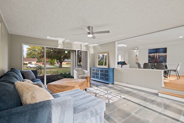 living room featuring ceiling fan