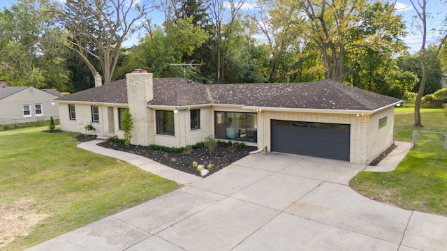 ranch-style home featuring a garage and a front yard