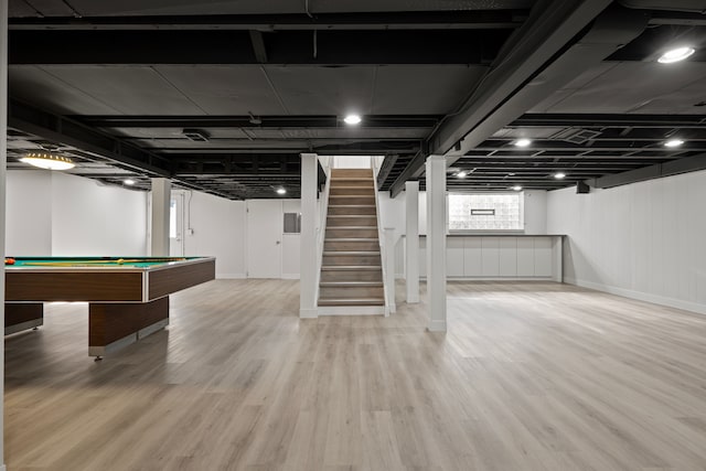 basement with hardwood / wood-style flooring and billiards