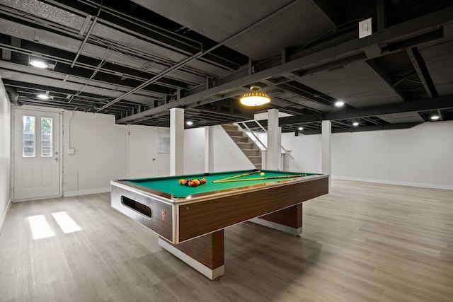 playroom with hardwood / wood-style flooring and billiards