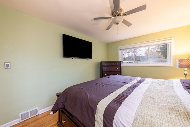 bedroom featuring ceiling fan and light wood-type flooring