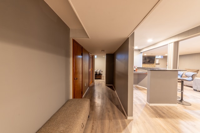 hallway featuring light hardwood / wood-style flooring