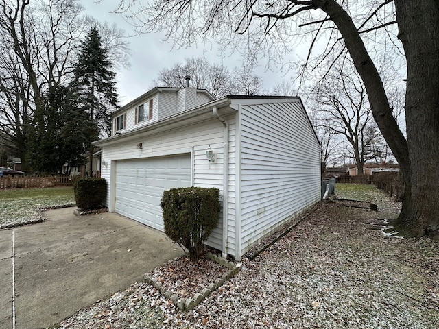 view of property exterior with a garage