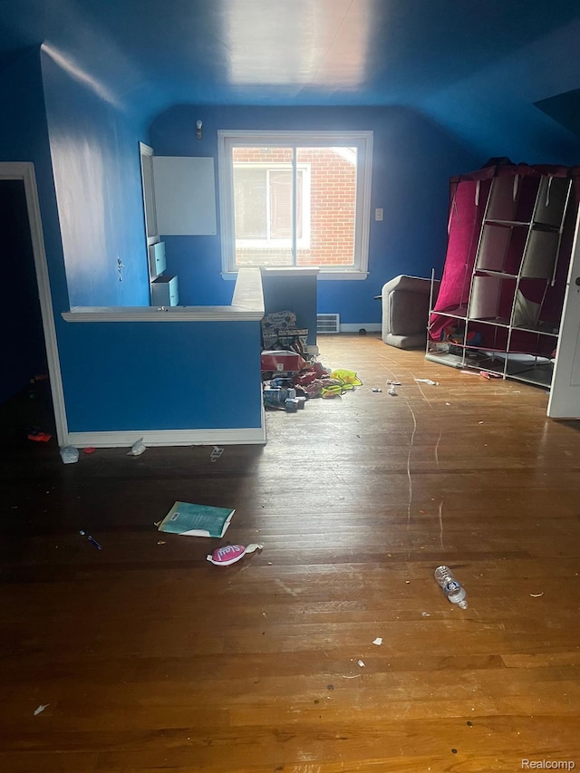19640 Charest St, Detroit, MI 48234 - bonus room featuring lofted ceiling and hardwood / wood-style floors