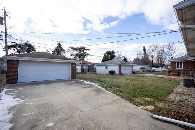 garage with a lawn