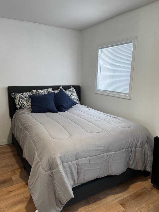 bedroom featuring light hardwood / wood-style flooring