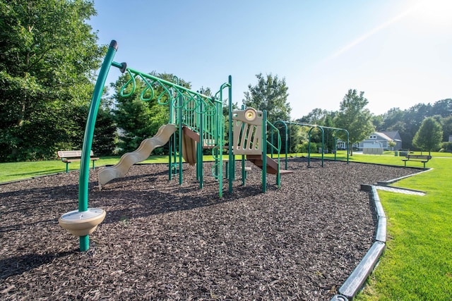 view of playground featuring a lawn