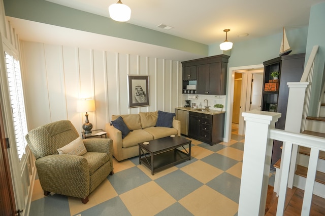 living room featuring sink