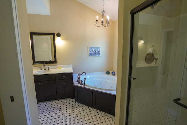 bathroom with vanity, separate shower and tub, a chandelier, and vaulted ceiling