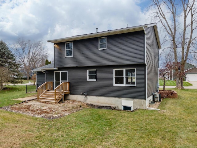 rear view of property with a lawn and central AC unit