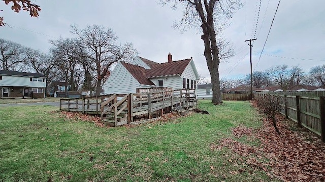 view of yard with a wooden deck