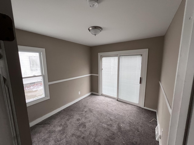 empty room featuring carpet