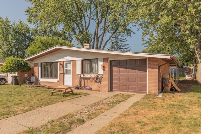 ranch-style home featuring a front lawn and a garage