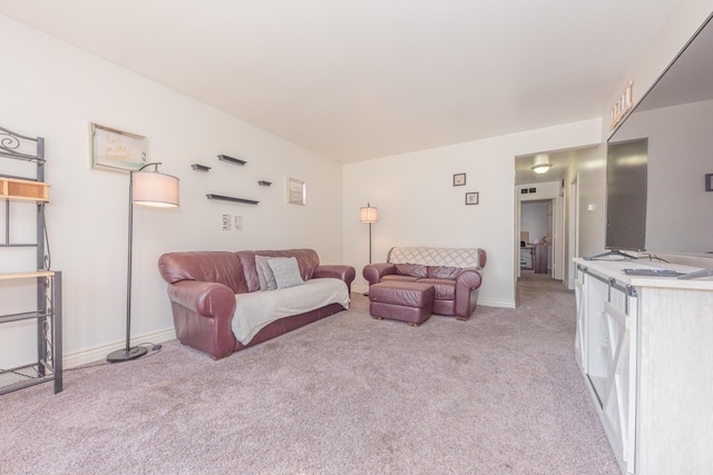 living room featuring light colored carpet