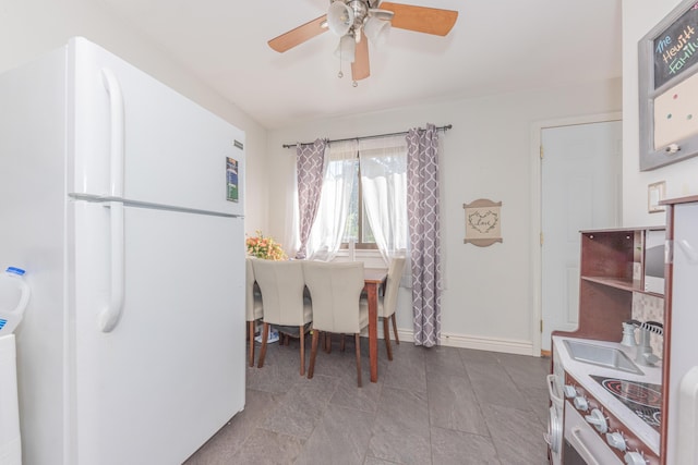 dining area featuring ceiling fan