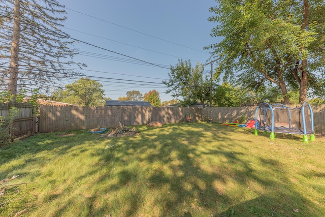 view of yard featuring a trampoline