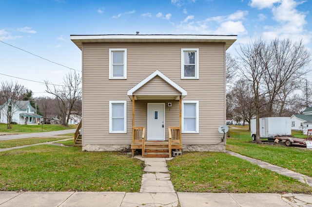 view of front of home with a front yard