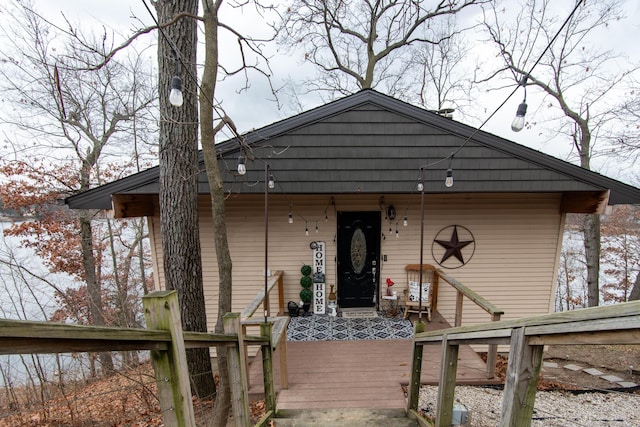 view of front of property featuring a wooden deck