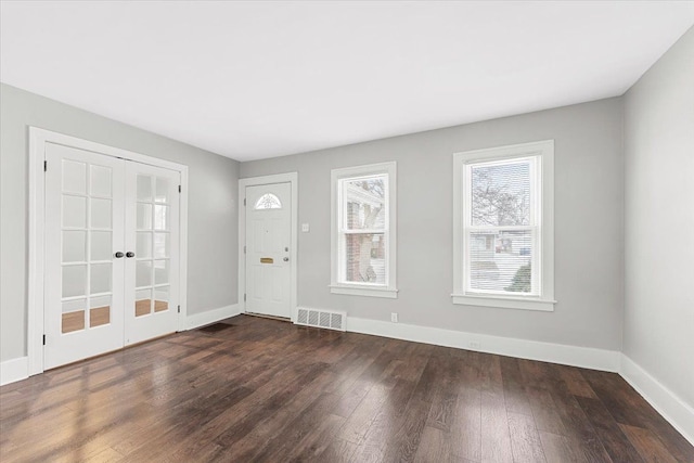 entrance foyer with dark hardwood / wood-style flooring