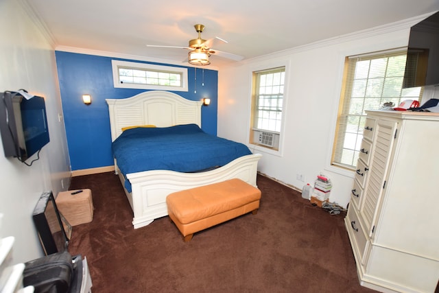 bedroom with ceiling fan, crown molding, and dark colored carpet