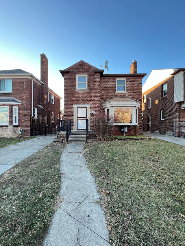 view of front facade with a front lawn