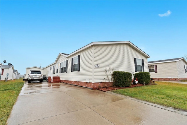 view of home's exterior featuring a lawn