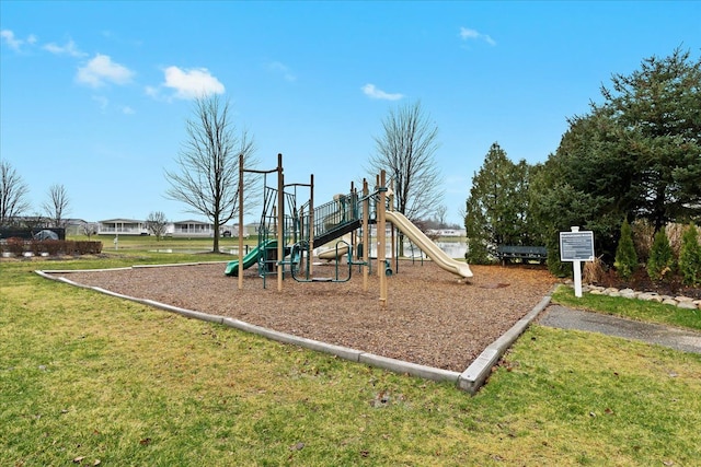 view of playground with a yard