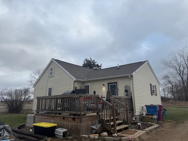 rear view of house with a deck