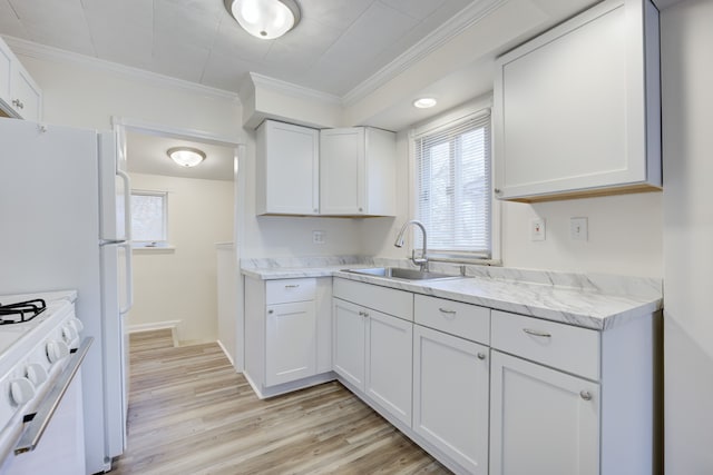 kitchen featuring crown molding, sink, white cabinets, and white electric range oven