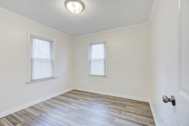 unfurnished room with crown molding, a textured ceiling, and light hardwood / wood-style flooring