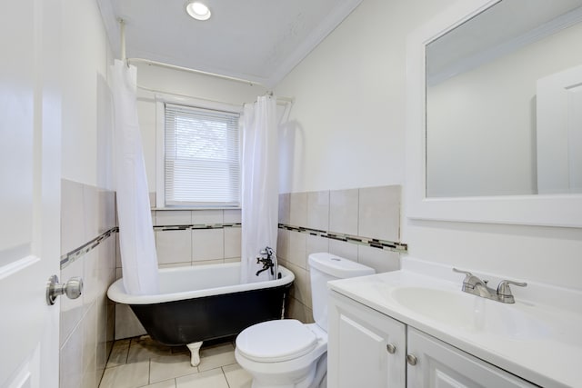 full bathroom featuring tile patterned floors, crown molding, shower / bath combination with curtain, toilet, and tile walls