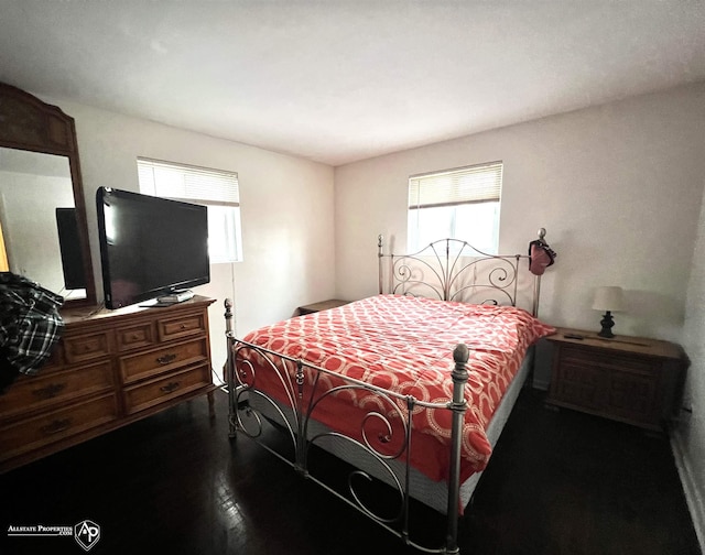 bedroom featuring hardwood / wood-style floors