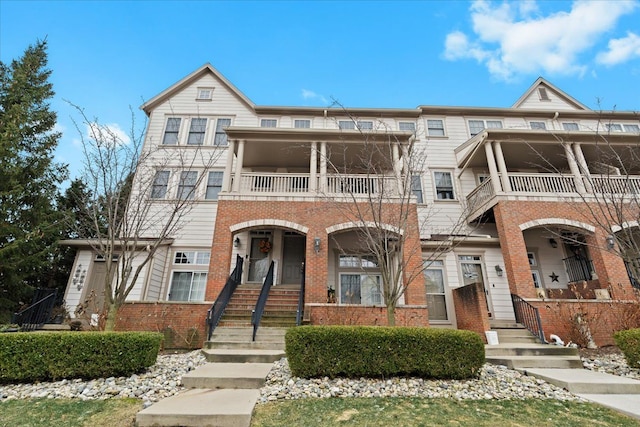 multi unit property featuring a balcony