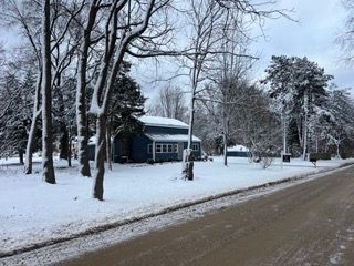 view of yard covered in snow