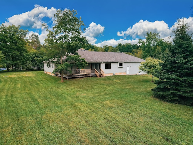 view of yard with a deck