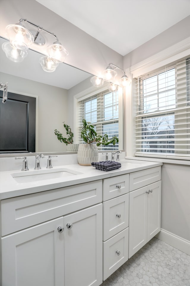 bathroom featuring tile patterned floors and vanity