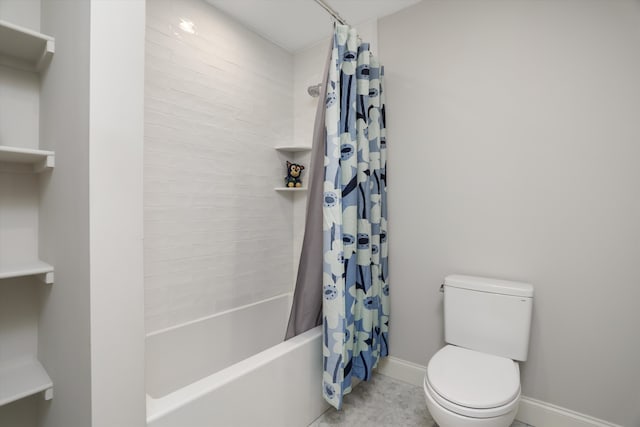 bathroom featuring toilet and shower / tub combo with curtain