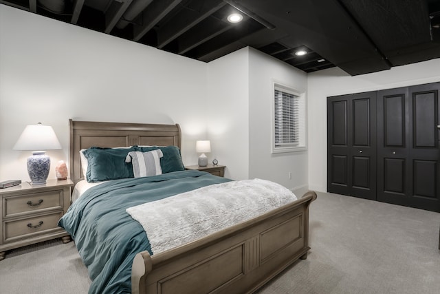 bedroom with light colored carpet