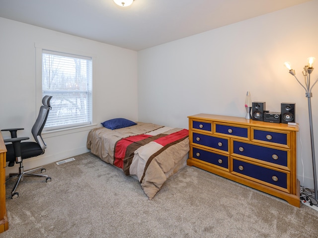 bedroom with carpet and visible vents