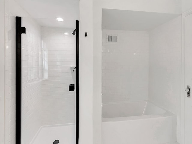 bathroom with independent shower and bath