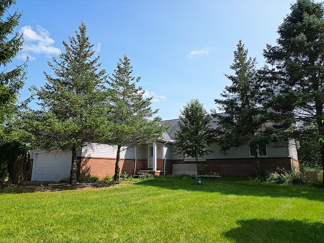 view of yard with a garage