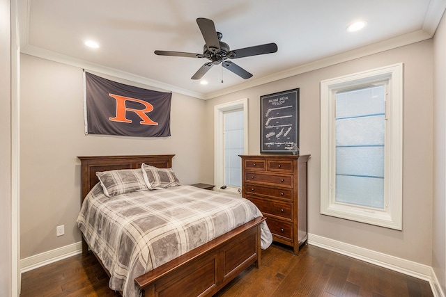 bedroom with ceiling fan, crown molding, and dark wood-type flooring