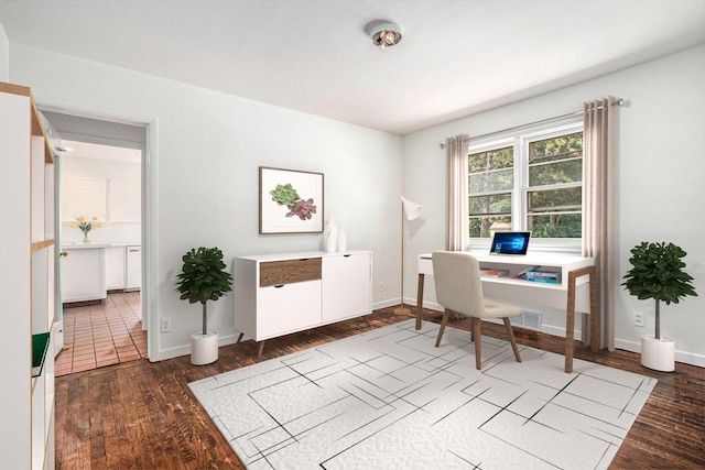 office space with dark wood-type flooring