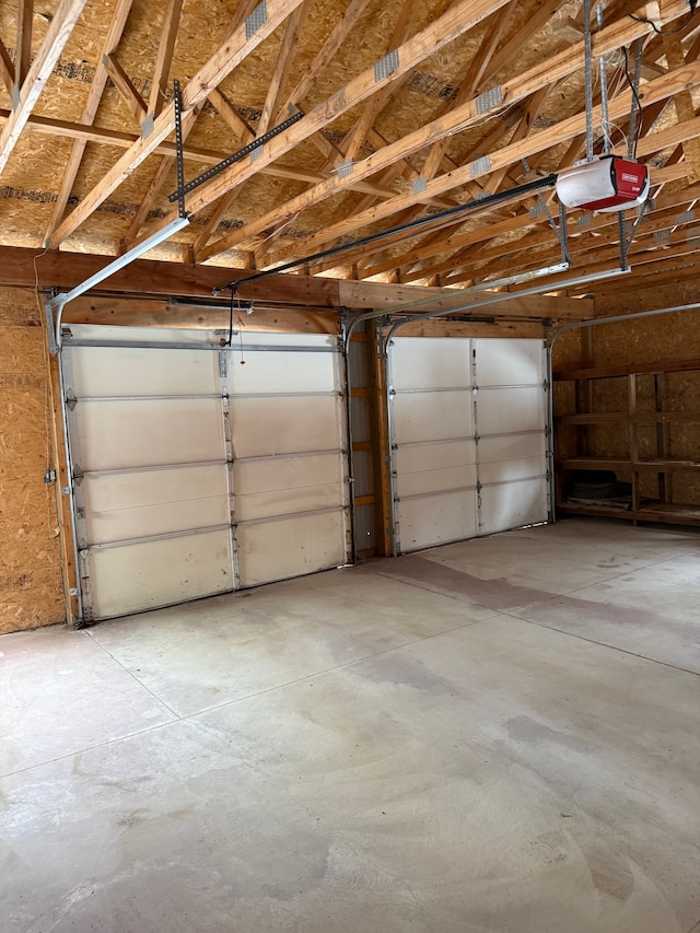 garage featuring a garage door opener