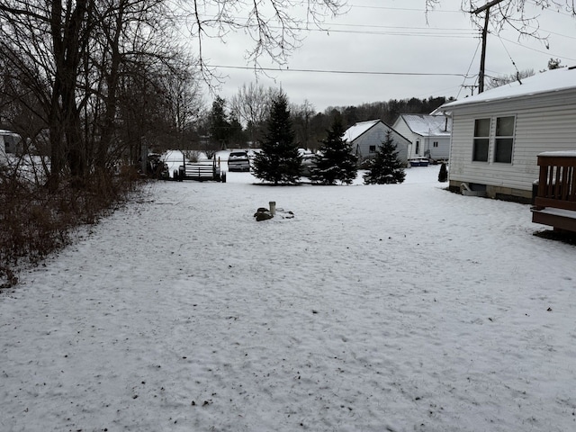 view of yard covered in snow