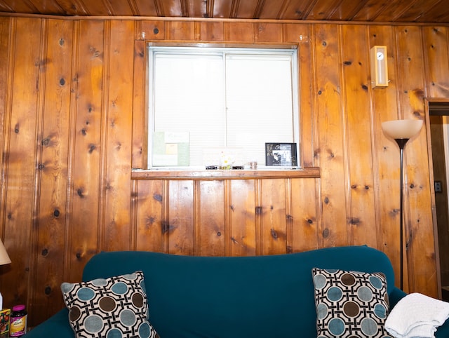 room details featuring wooden walls and wood ceiling