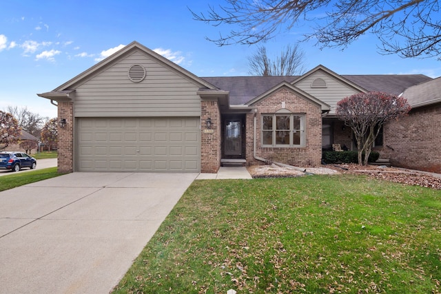 ranch-style house featuring a garage and a front yard