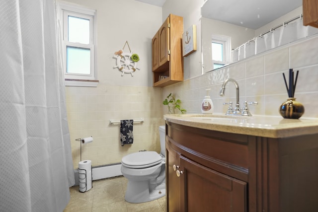 bathroom with tile patterned flooring, toilet, tile walls, and a baseboard radiator